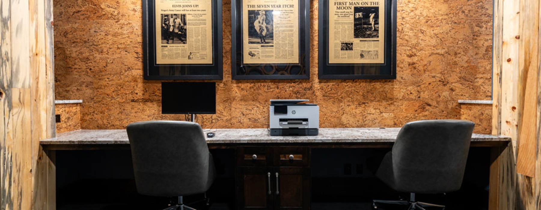 a business lounge area with a computer