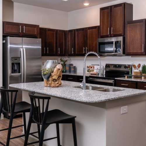 Beautiful kitchens with designer finishes Well-lit kitchen with ample counter space