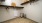 a walk-in closet with ample shelving