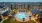 Resort-style swimming pool with lounge seating