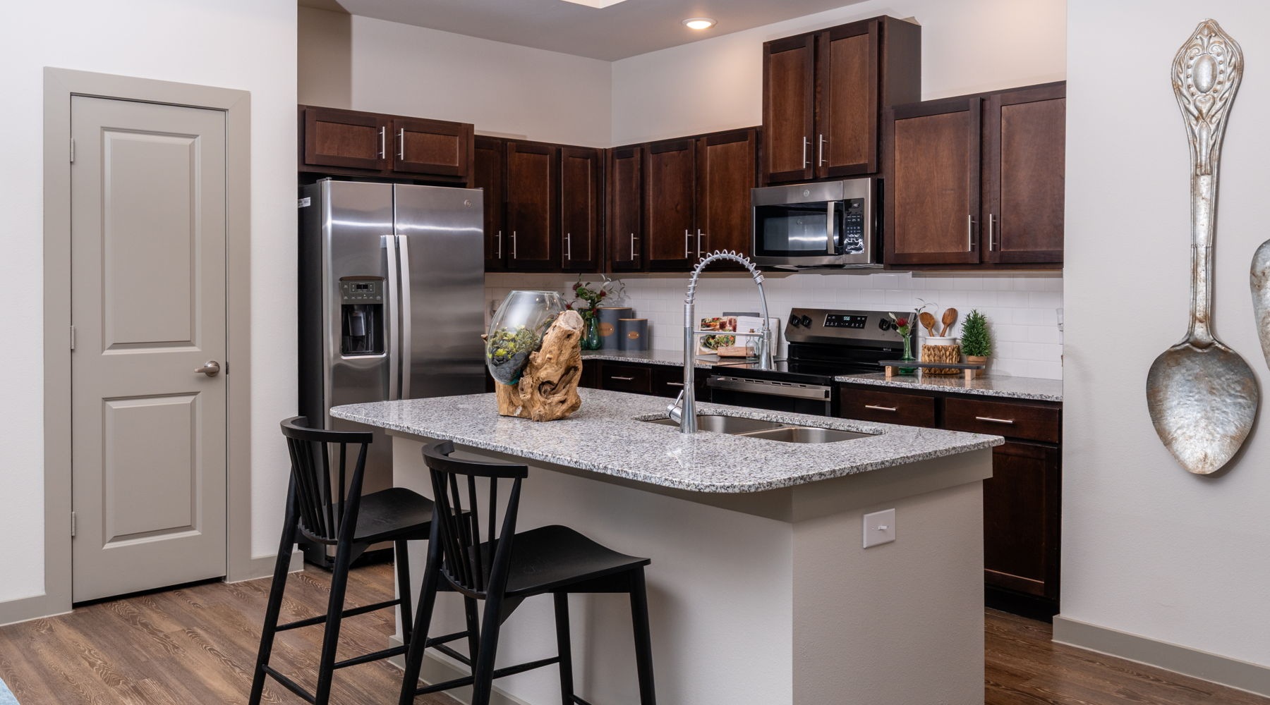 Beautiful kitchens with designer finishes Kitchen with bar style seating
